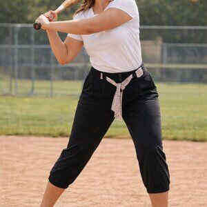 Easton, XXL black baseball pants with pink belt
Tie. Active wear softball